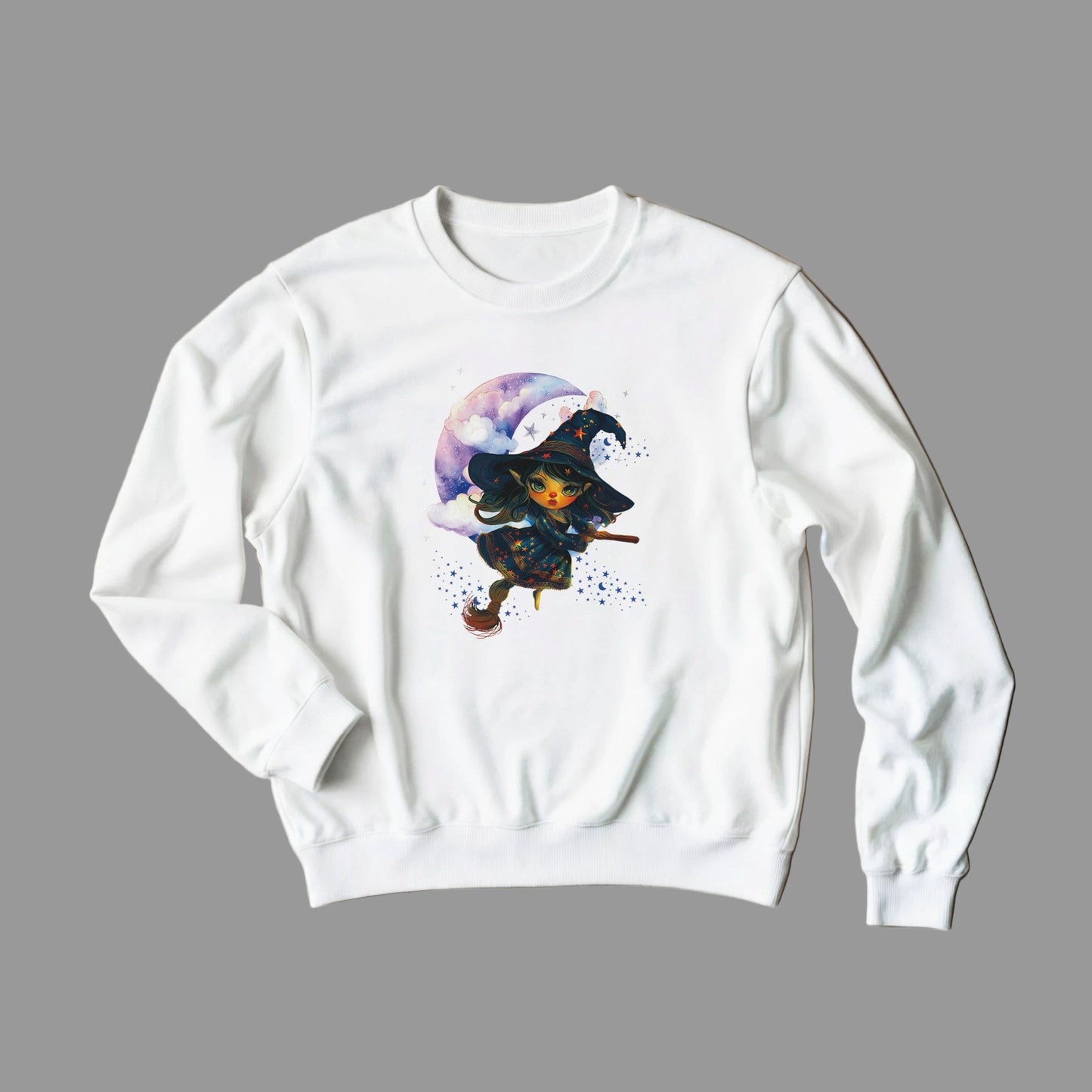 White sweatshirt with a graphic design of a witch on a broomstick and rainbow-colored hat on a light gray background.