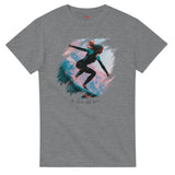 Gray t-shirt with a graphic of a person surfing on a colorful wave design.