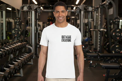 Man wearing a white t-shirt with 'OUTWORK EVERYONE' text on a white background