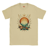 A sand short-sleeve crewneck T-shirt featuring a central graphic of a seashell, starfish, and seagrass in warm earthy tones, displayed flat against a white background.