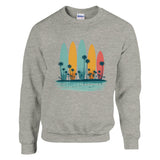 Gray sweatshirt with colorful surfboard design and palm trees on a white background