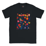 Black unisex T‑shirt featuring a minimalist poppy design in vibrant reds, pinks, and greens—with clean lines and botanical elegance—against a white background. Soft cotton tee shown flat for clarity.