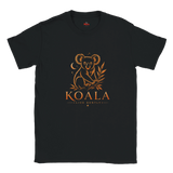 A black short-sleeve crewneck t-shirt featuring a stylized golden koala graphic with the text 'KOALA LIVE GENTLY' printed on the front, displayed against a solid white background.