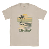 Sand t-shirt with a tropical graphic and 'The Swell' text on a white background