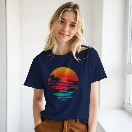 Woman wearing a navy blue t-shirt with a colorful sunset design.