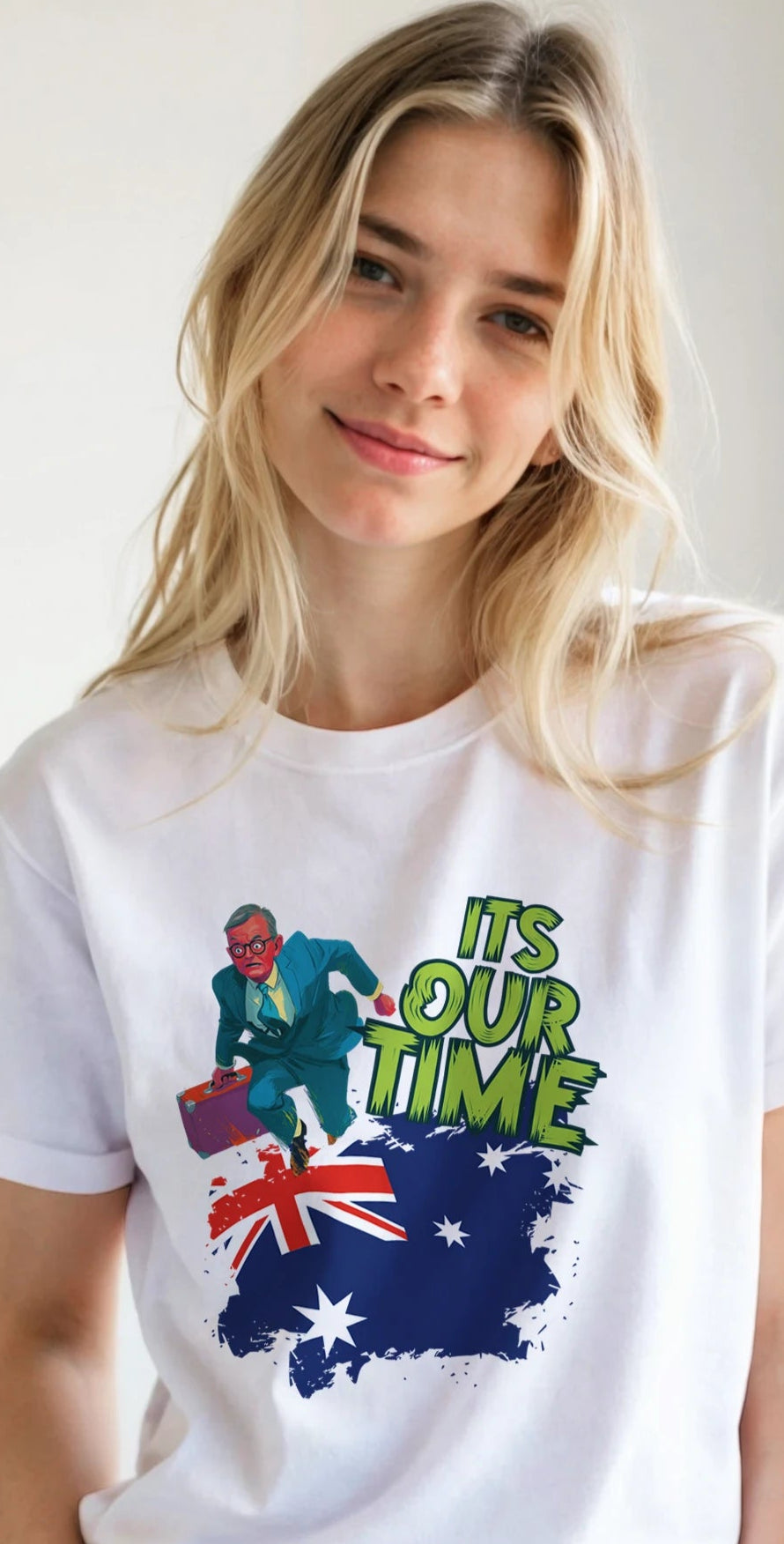 Person wearing a white t-shirt with a graphic design featuring an Australian flag and text.