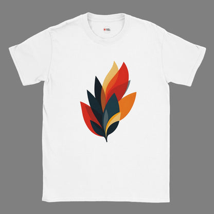 A white cotton T-shirt with a modern abstract autumn leaf design in layered shades of orange, red, yellow, and dark teal, styled on a wooden surface with a straw hat and denim jeans. The shirt features the MytsDesigns logo.