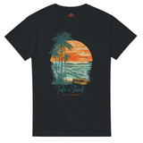 Black t-shirt with a tropical design featuring palm trees and a sunset, on a white background.