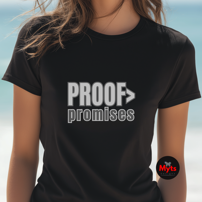 Black t-shirt with 'PROOF > promises' text worn by a person, with a blurred background.