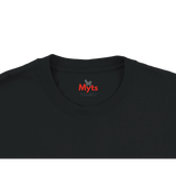Close-up of a black crewneck t-shirt showing the inner neck label with a red 'Myts' logo and a small gray goat graphic.