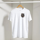 White t-shirt with a logo and text on a hanger against a plain background