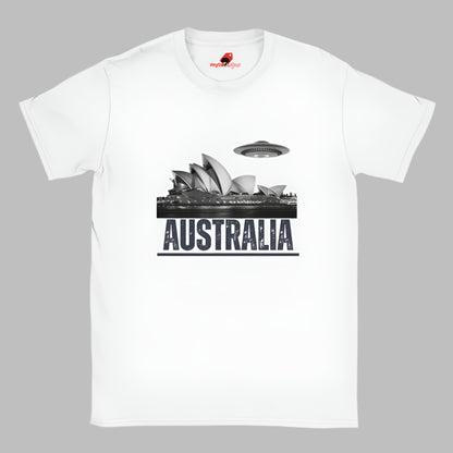 Front view of a white soft casual tee showing the Sydney Opera House sails with a sleek spaceship graphic orbiting overhead, printed on ultra-soft Gildan 64000 cotton.