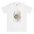 “Front view of a white Unbound Nautilus T-shirt with seashell, botanical and geometric artwork.”