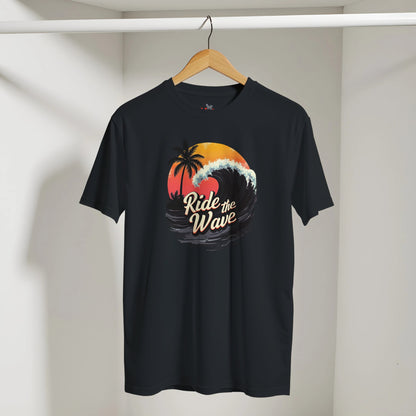 Black t-shirt with 'Ride the Wave' design on a hanger against a white wall