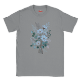 A gray short-sleeve crewneck t-shirt featuring a central graphic of a bouquet with light blue and white flowers, teal-green leaves, and dried botanical stems. The brand name 'Mits' is printed in red inside the collar.