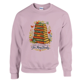 Light Pink sweatshirt featuring vintage stacked books artwork with floral accents and “There’s No Such Thing As Too Many Books” text.