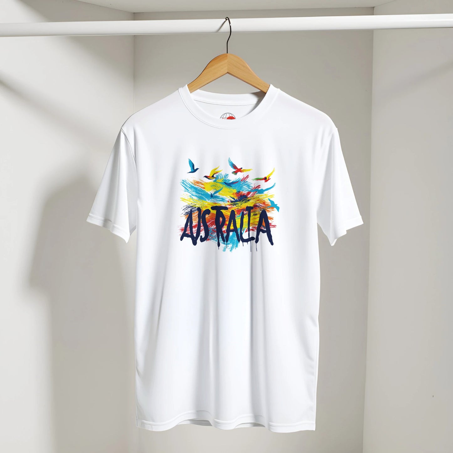 White t-shirt with colorful 'Australia' design on a hanger against a white wall.