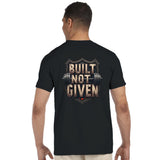 Person wearing a black t-shirt with 'Built Not Given' text and barbell graphic on the back.
