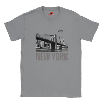 Sports Grey soft casual tee showing the New York City skyline with a stylized spaceship graphic soaring above, printed on ultra-soft Gildan 64000 cotton.