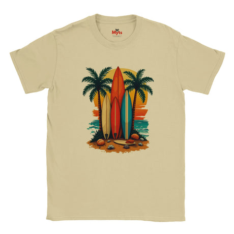 Sand t-shirt with a tropical design featuring surfboards and palm trees on a white background.