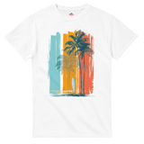 White t-shirt with a colorful palm tree and surfboard design on a white background