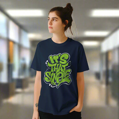 A young woman wearing a navy T-shirt featuring groovy 60s-style “It’s That Simple” psychedelic text design – printed on soft cotton