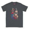 A dark heather gray t-shirt with a colorful graphic print of red, blue, and cream flowers under a crescent moon, shown on a plain white background.