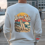 Broken Relic white unisex crewneck sweatshirt with small front surf graphic and large vintage surfboard beach design on back