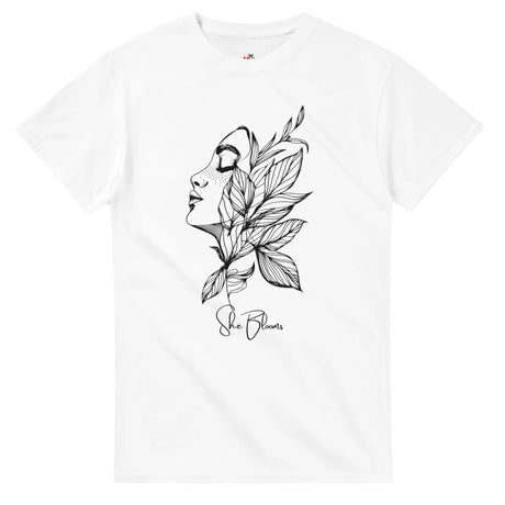 White t-shirt with black floral and face design on a white background