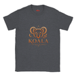 A dark heather gray t-shirt with a graphic of a koala face and the word 'KOALA' in orange, with 'MY TREE, MY HOME' underneath, on a plain white background.