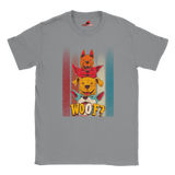 A flat lay sports grey T-shirt featuring a playful graphic of four stacked colorful dogs in yellow, red, and blue tones with the word “Woof?” in bold, cartoonish text below.

