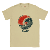A Sand crewneck t-shirt featuring a distressed graphic of a surfer inside a red and dark blue wave, with the word 'SURF' printed below.