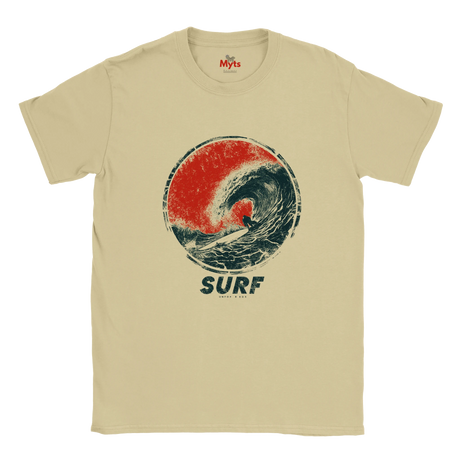 A Sand crewneck t-shirt featuring a distressed graphic of a surfer inside a red and dark blue wave, with the word 'SURF' printed below.