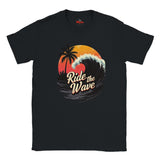 Black t-shirt with 'Ride the Wave' graphic design featuring a sunset and palm trees on a white background.