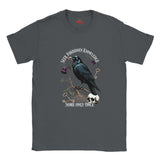 Gray t-shirt with a crow graphic and text on a white background