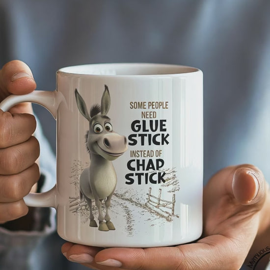 Video of a woman drinking from funny Donkey Coffee Mug