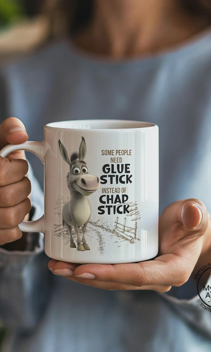 Video of a woman drinking from funny Donkey Coffee Mug