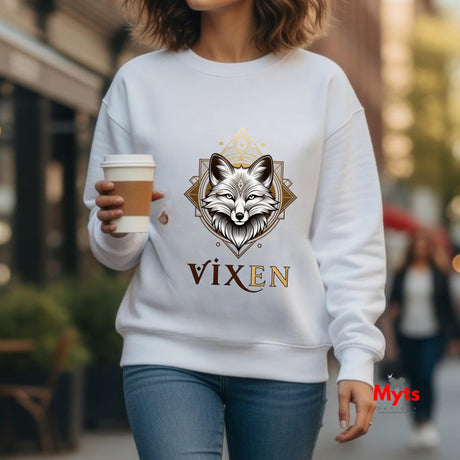 Person wearing a white sweatshirt with a fox design and 'VIXEN' text, holding a coffee cup.